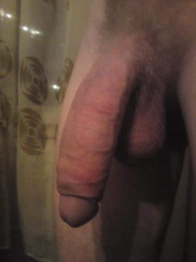 Muscle guy with a huge flaccid dick